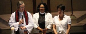 About Wesley Theological Seminary photo of three students leading communion