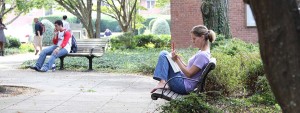 student studying on campus