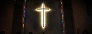 Cross in Wesley's chapel during a Taize service