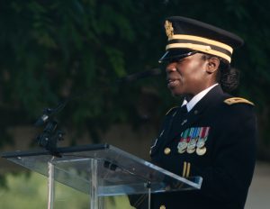 U.S. Army Chaplain (Capt.) Azande Sasa gives the invocation during the opening ceremony for the National Association of Landscape Professionals’ 19th annual Renewal and Remembrance at Arlington National Cemetery, July 16, 2015. Over 400 volunteers worked on 200 of the cemetery’s 624 acres. Some of the work done was mulching, pruning, aerating, planting, liming and applying gypsum. (U.S. Army photo by Rachel Larue/released)