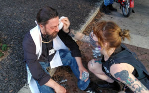 The Rev. Jason Perkowski, a United Methodist pastor, receives assistance after being sprayed with mace during a protest in Lancaster, Pa. Photo courtesy of Jason Perkowski.